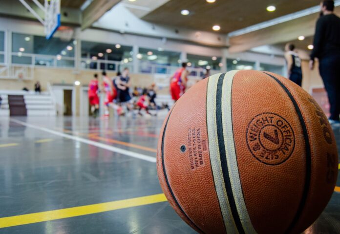 brown basketball on grey floor